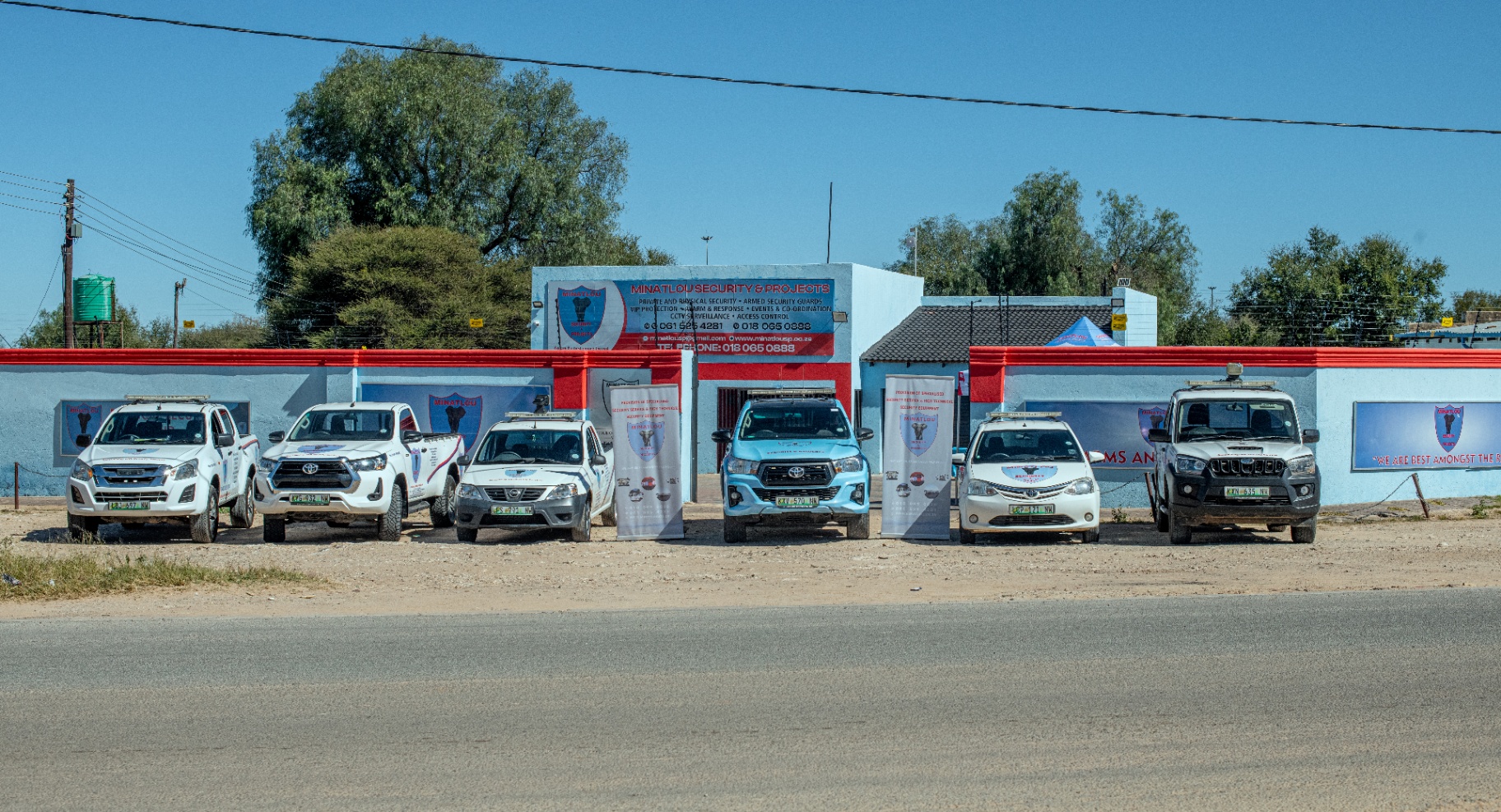 The full Minatlou Security & Projects fleet lined up in front of company premises
